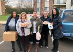 The Indianapolis staff deliver Thanksgiving meals to families in need.